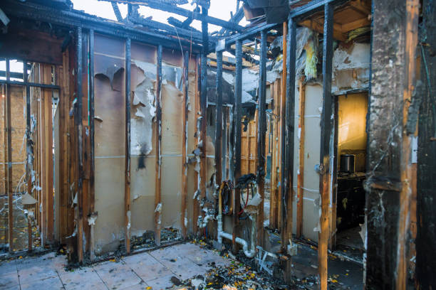 Professional Fire Damage Restoration technician working in Saylorville, IA